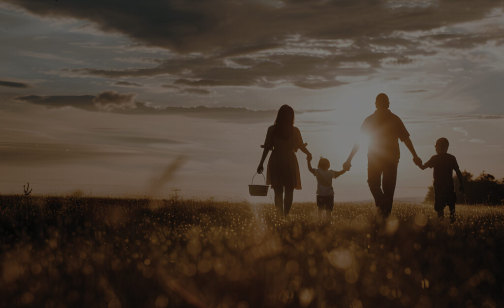 happy family waking into sunset law firm chicago background