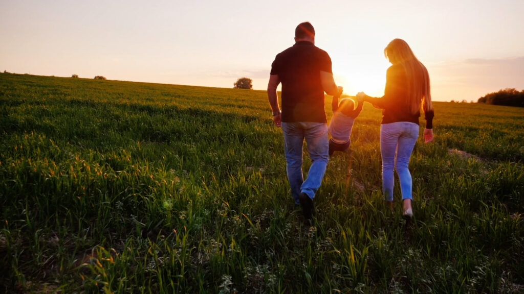 parents and child walking on grass divorce lawyer near me background, estate planning, estate plan